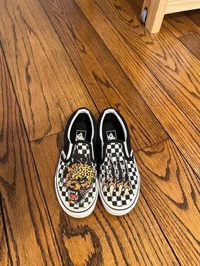 Vans Kids Black & White Checkerboard Slip-Ons with Leopard and Claw Graphics